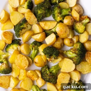 30-Minute Roasted Baby Potatoes & Broccoli with Garlic Butter 9 Golden brown honey gold potatoes and crispy roasted broccoli on a serving platter.