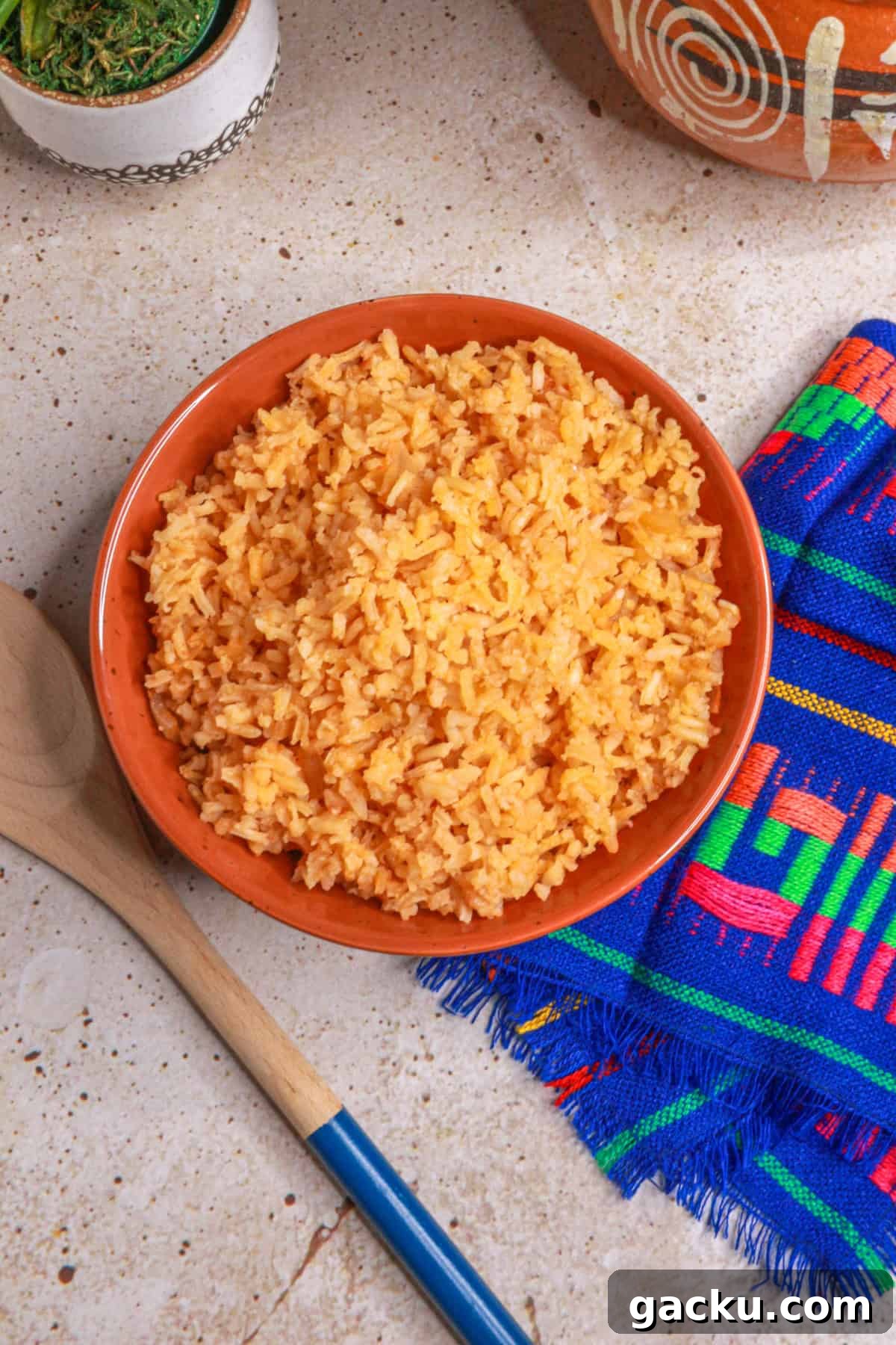 Authentic Mexican Red Rice Recipe: Fluffy, Flavorful Arroz Rojo 2 Top view of arroz rojo (Mexican red rice) in a bowl