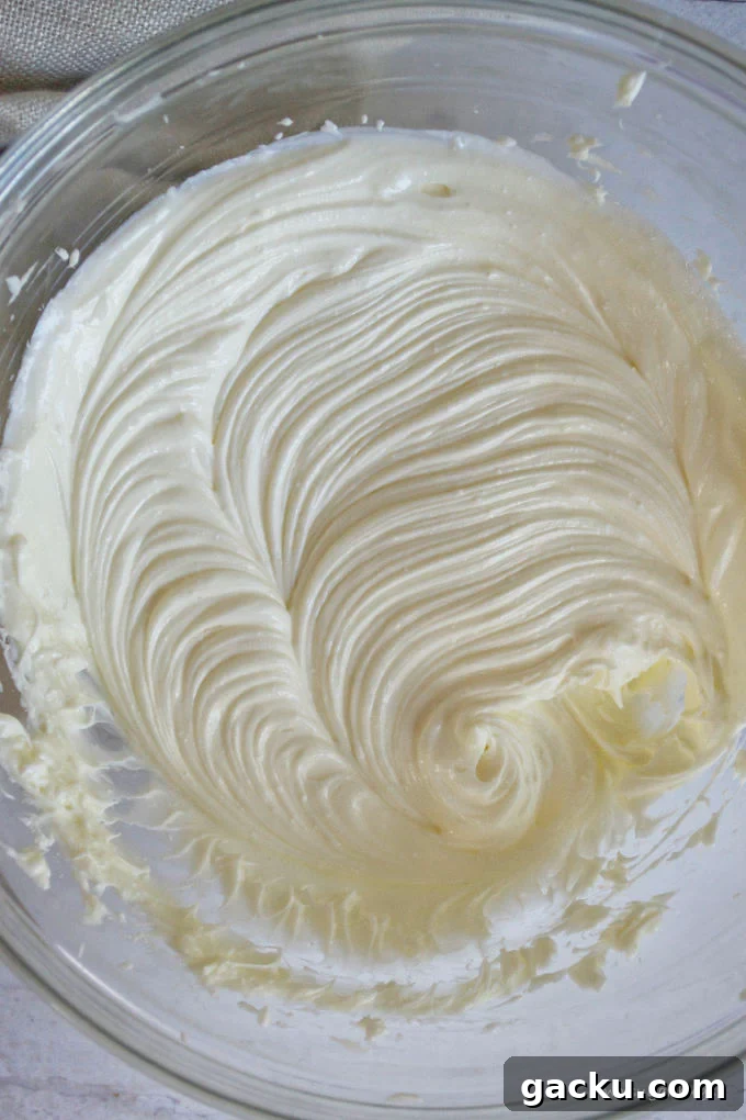 Mini Peanut Butter Espresso No-Bake Cheesecakes 14 whipped cream cheese, butter, sour cream and vanilla in a mixing bowl