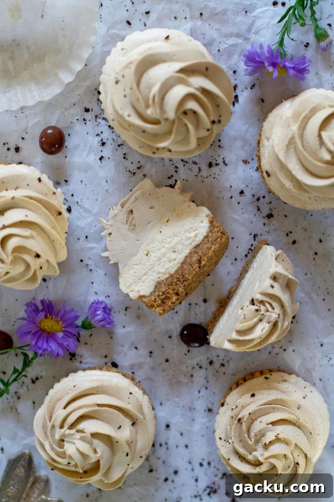 Mini Peanut Butter Espresso No-Bake Cheesecakes 21 mini cheesecakes on parchment paper, with a slice shot showing the layers