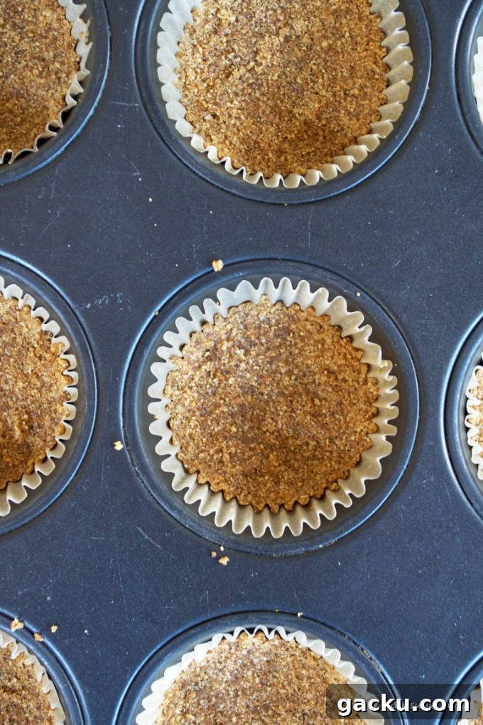 Mini Peanut Butter Espresso No-Bake Cheesecakes 10 espresso graham cracker crust pressed into prepared muffin pan
