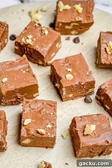 Christmas fudge sliced in squares and placed on a serving tray.