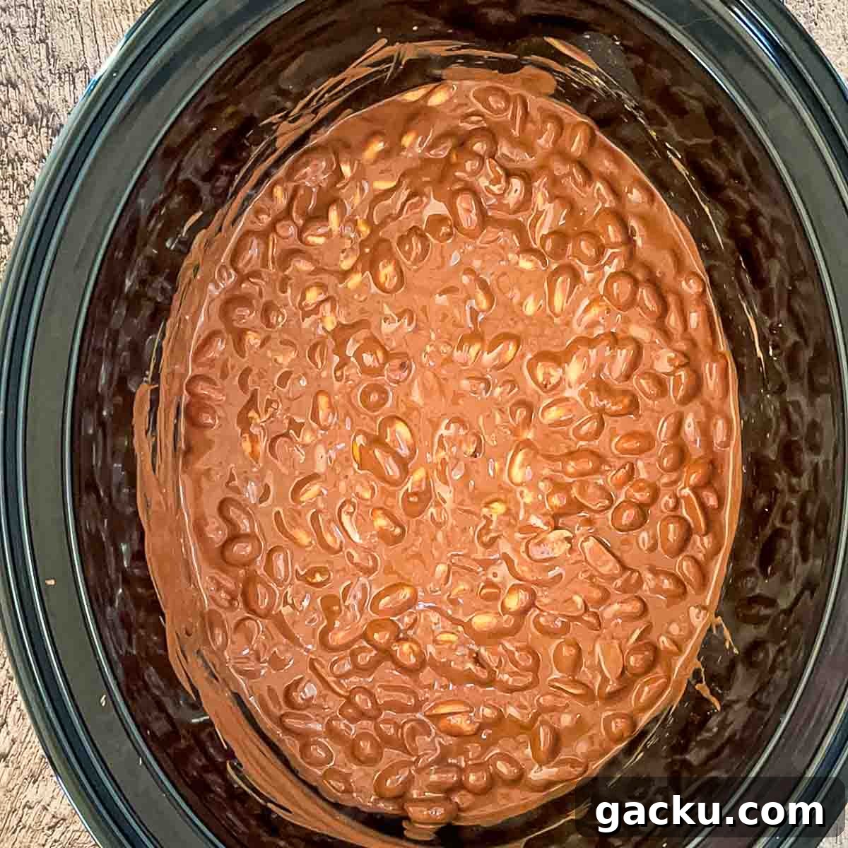 The melted chocolate mixture in the slow cooker after an hour on low.
