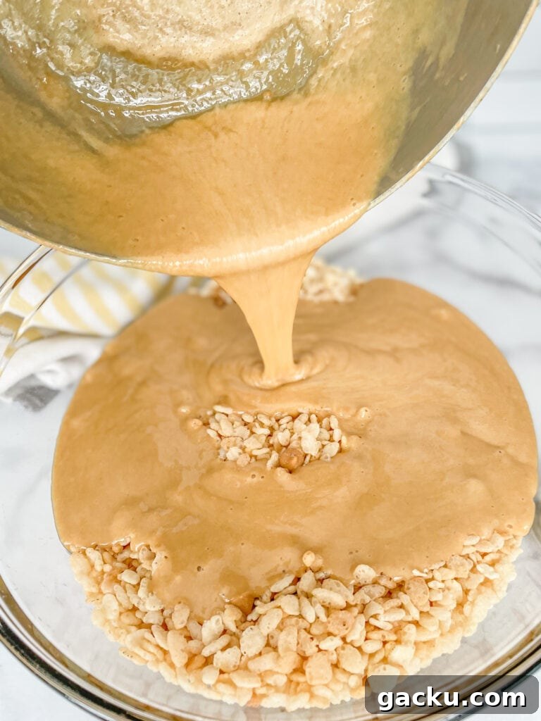Melt Peanut Butter, Marshmallows, and Butter together until smooth and pour over your Rice Krispies Cereal