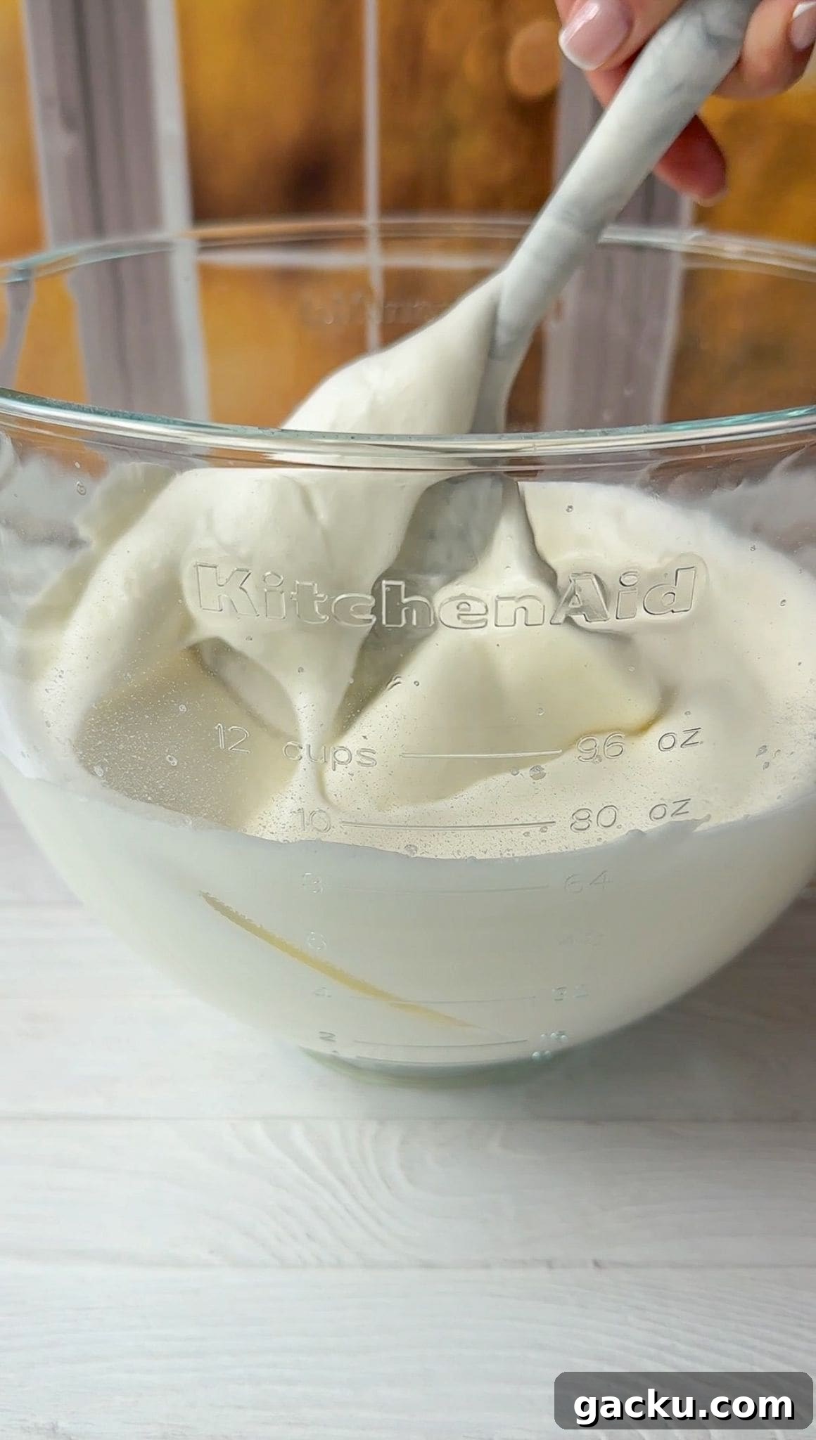 Fluffy Cloud Bread Recipe: Soft, Airy Sandwich Loaf in Minutes 6 The yogurt is being gently folded into the fluffy egg whites.