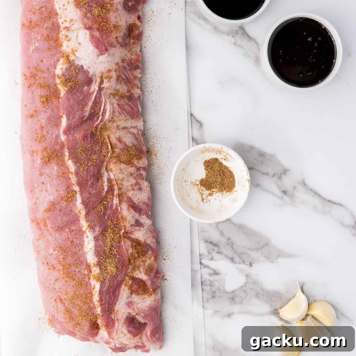 Slow-Cooked Honey Garlic Ribs with Sticky Glaze 4 Combine the onion powder, paprika, and cumin, and rub the ribs with dry rub.