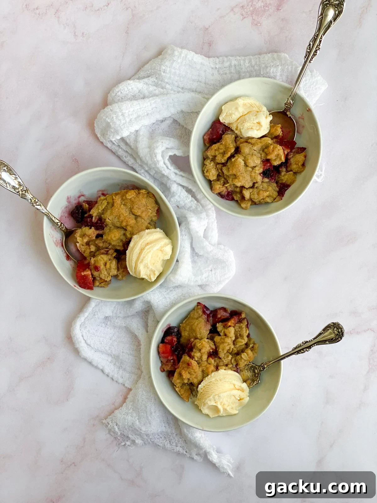 Blackberry Apple Crumble Recipe: Rustic Dessert with Oat Topping 2 3 individual servings of blackberry and apple crumble.