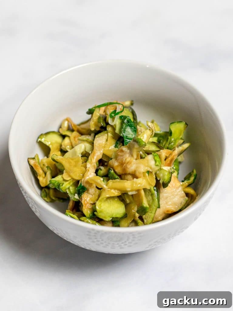 Korean dried zucchini side dish in a small white bowl