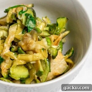 closeup of Korean dried zucchini side dish in a small white bowl