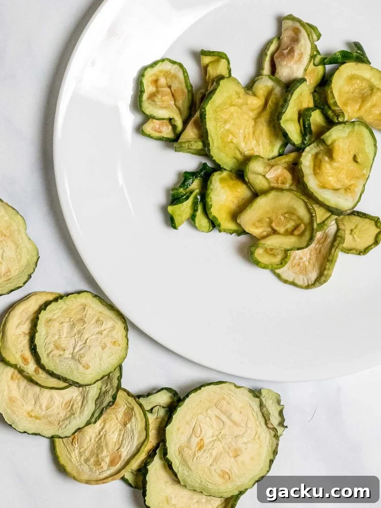 dried zucchini slices on a white place