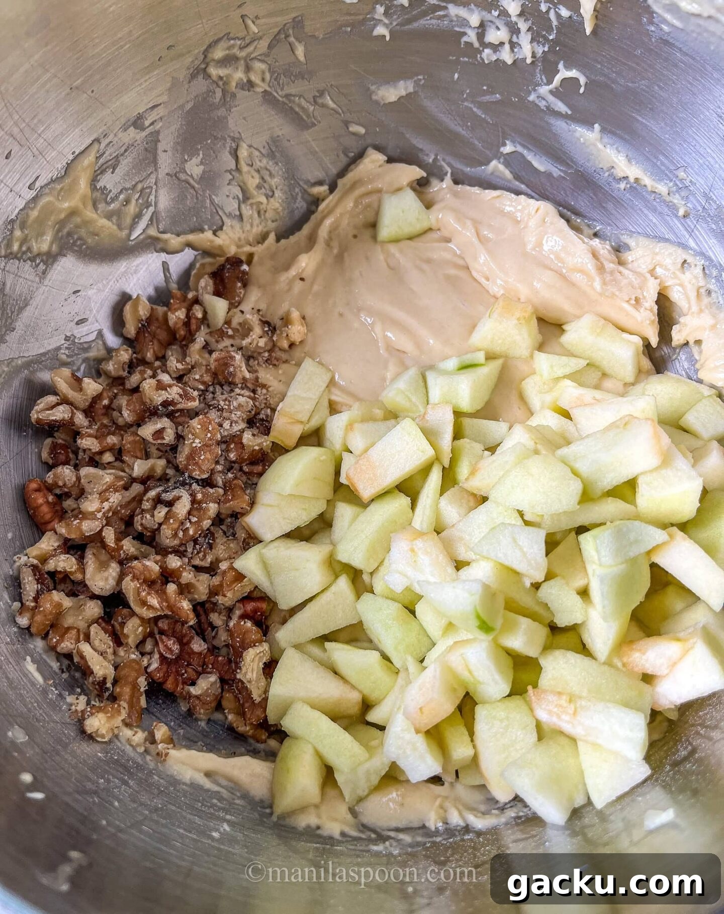 Apple Praline Sweet Bread Recipe with Crunchy Caramel Topping 5 Folding apples into batter