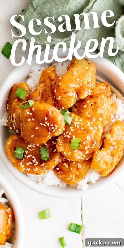 picture of sesame chicken on a bowl of rice