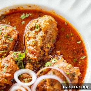 Quick Pressure Cooker Chicken Curry Recipe for Tender, Flavorful Chicken 6 pressure cooker chicken curry served with sliced onion rings