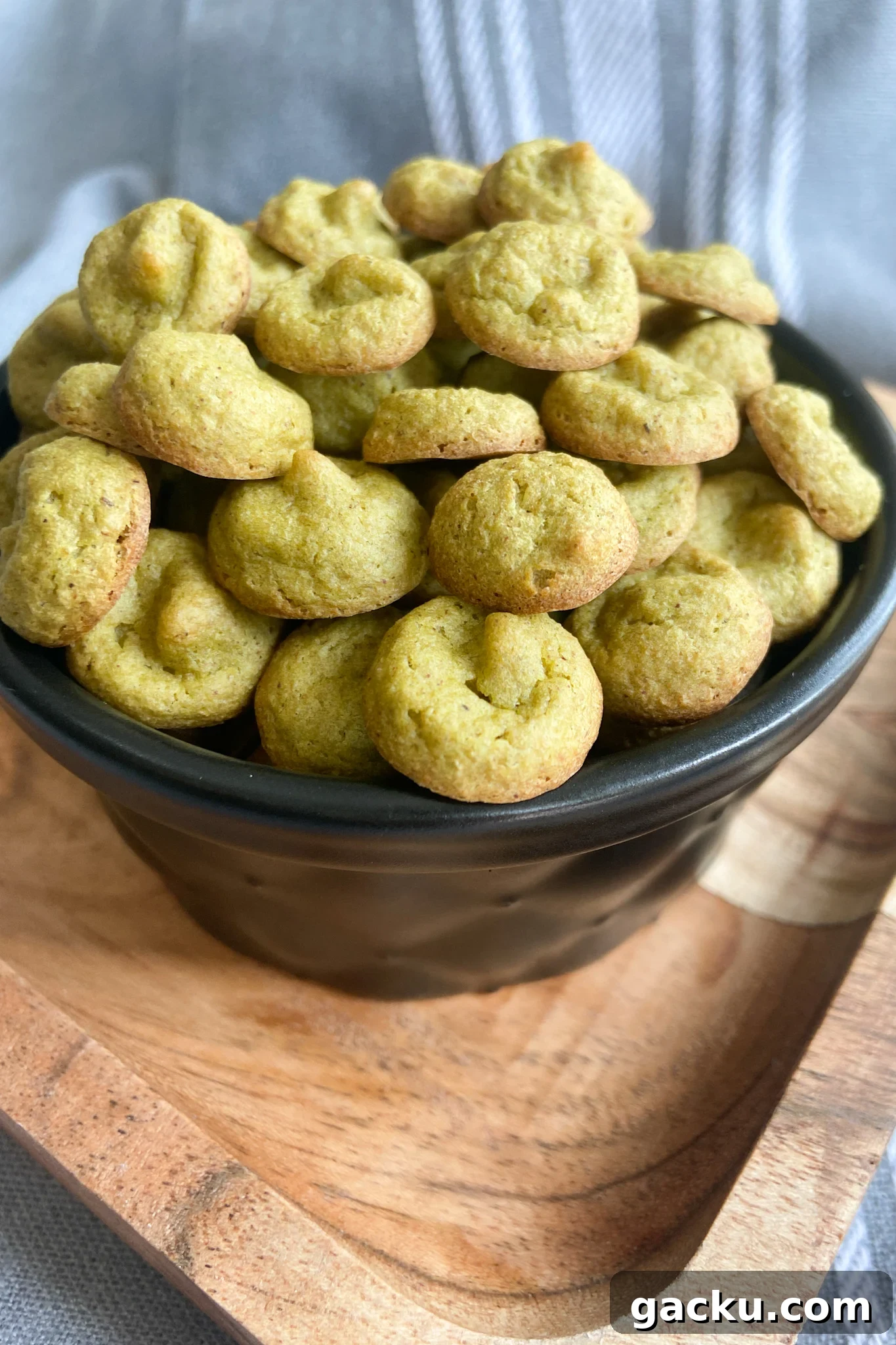 Kid-Friendly Halloween Snack Ideas Kids Will Love 14 Spinach banana puffs served in a black container