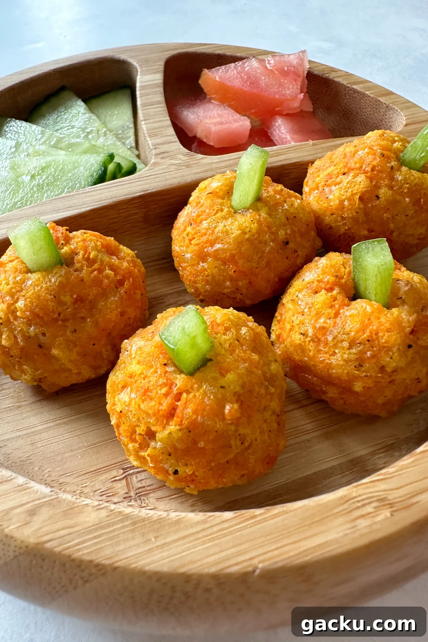 Kid-Friendly Halloween Snack Ideas Kids Will Love 6 Cheesy carrot ball pumpkins.