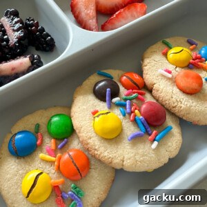 Kid-Friendly Halloween Snack Ideas Kids Will Love 9 Chocolate chip almond cookies served with fruits.