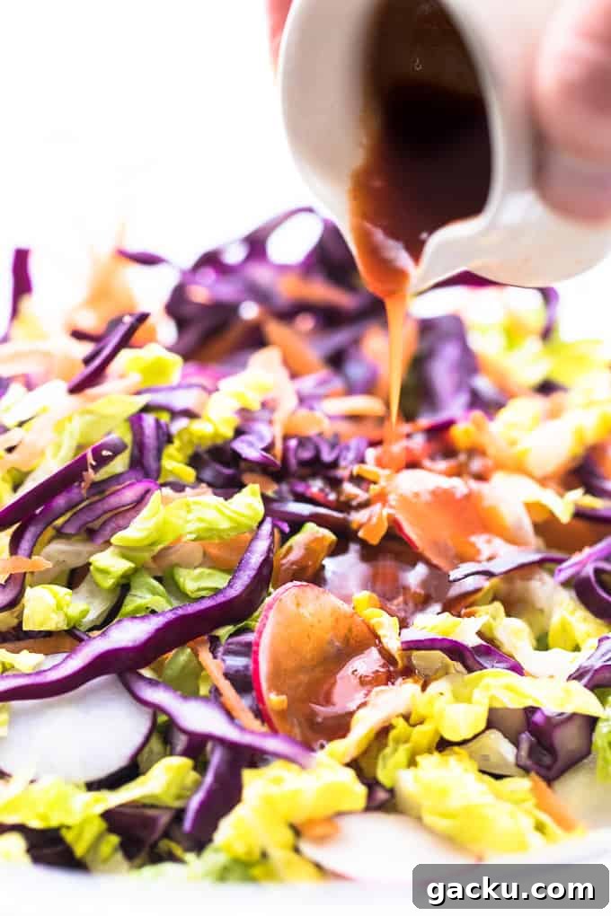 Coconut mango noodle salad with dressing.