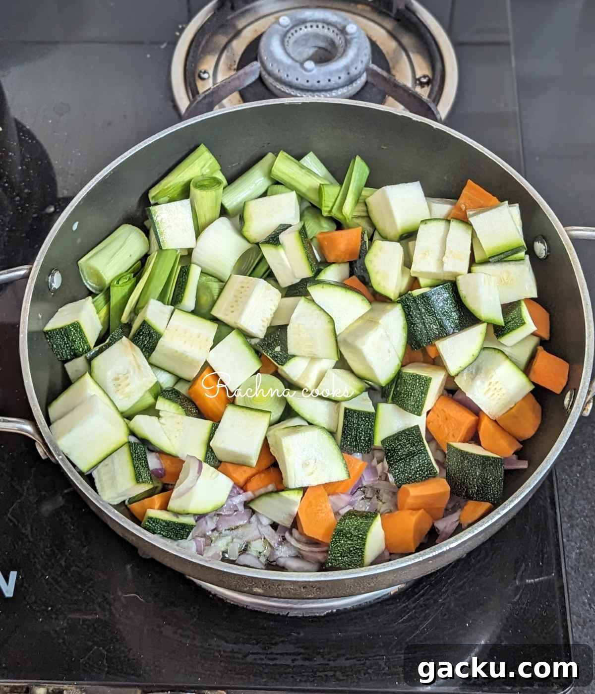 Creamy Leek, Cauliflower & Potato Soup Recipe for Cozy Meals 5 Pan with onion, garlic, leeks, zucchini, carrots and cauliflower