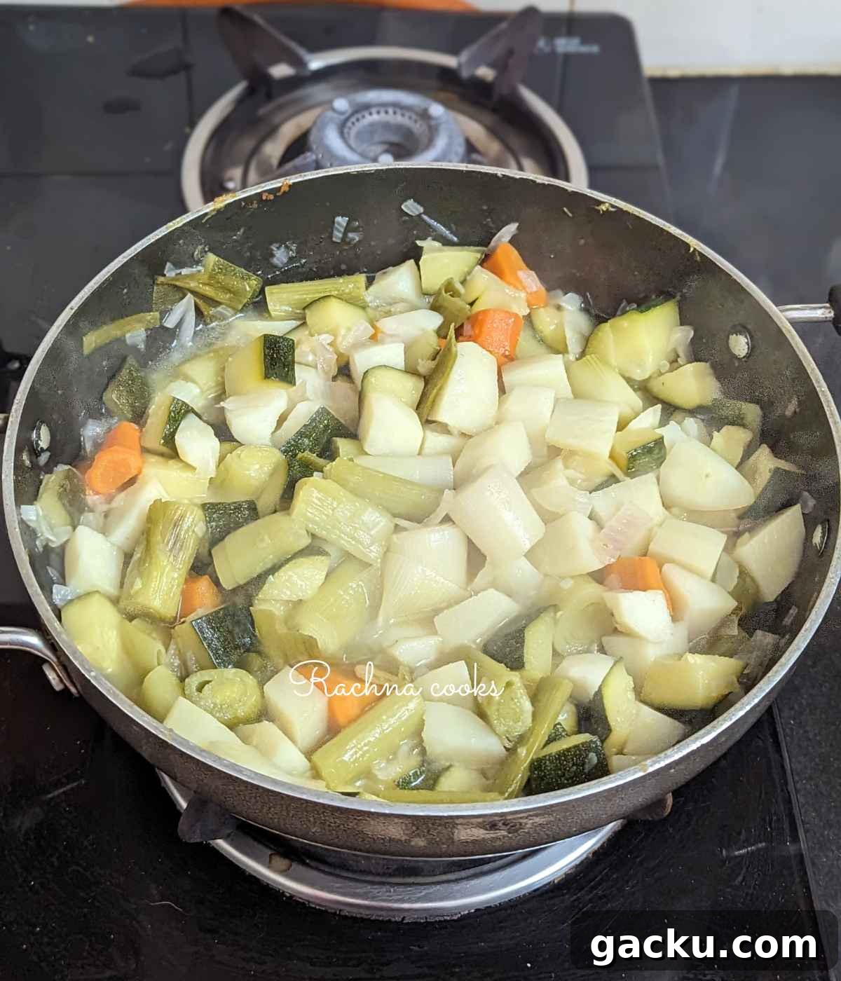 Creamy Leek, Cauliflower & Potato Soup Recipe for Cozy Meals 7 Vegetables being cooked in a pan.