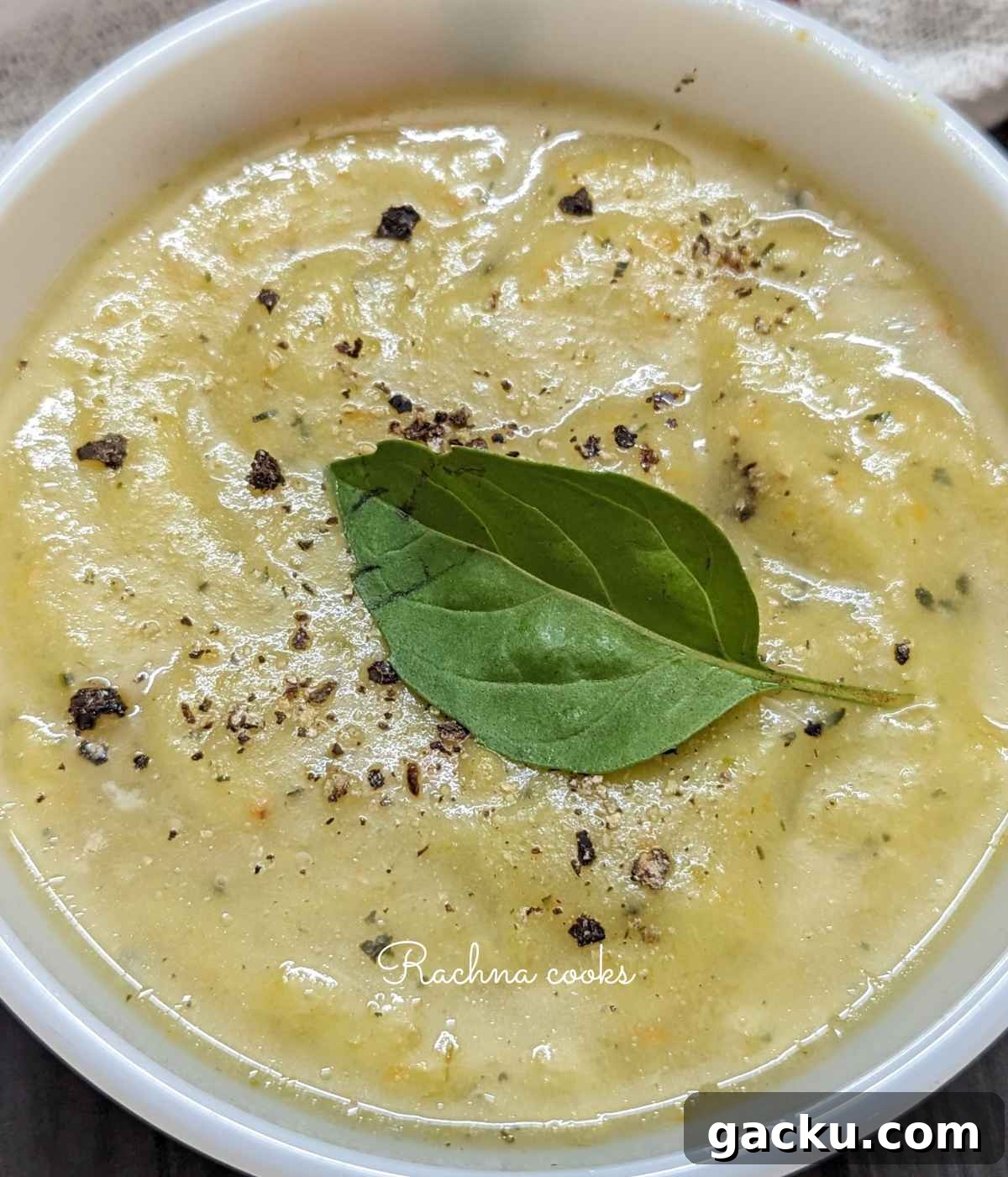 Creamy Leek, Cauliflower & Potato Soup Recipe for Cozy Meals 9 Close up of leek cauliflower and potato soup in a bowl.