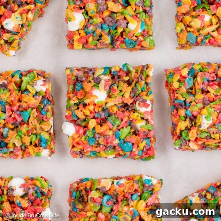 Fruity pebbles treats on a white board.