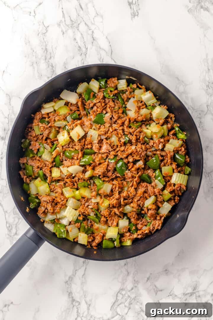 Sausage and vegetables in skillet