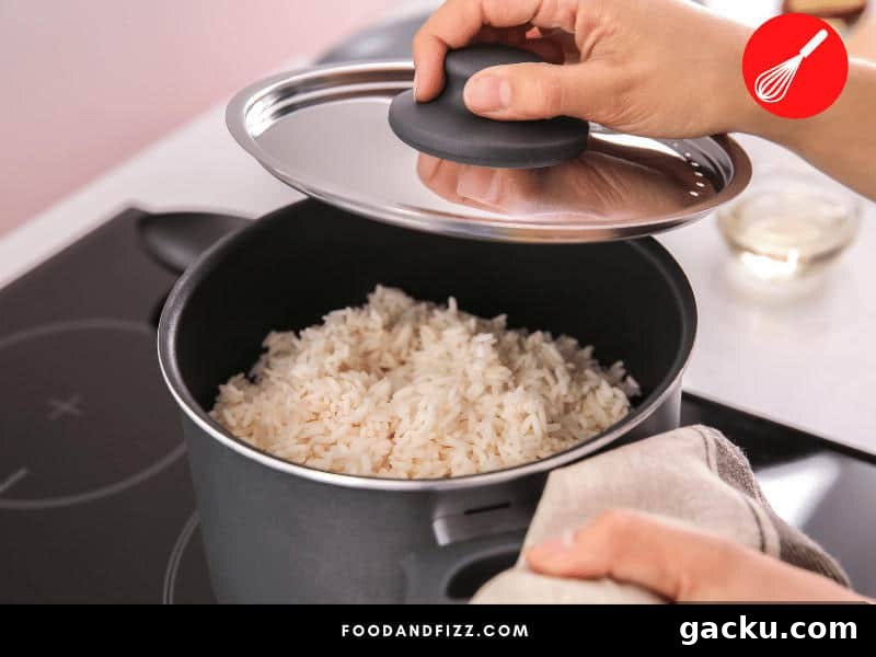 Whether you are using the absorption method or the boiling method, rice needs to be cooked with a tight-fitting lid on top to properly cook. For the boiling method, drain excess water once rice is cooked.
