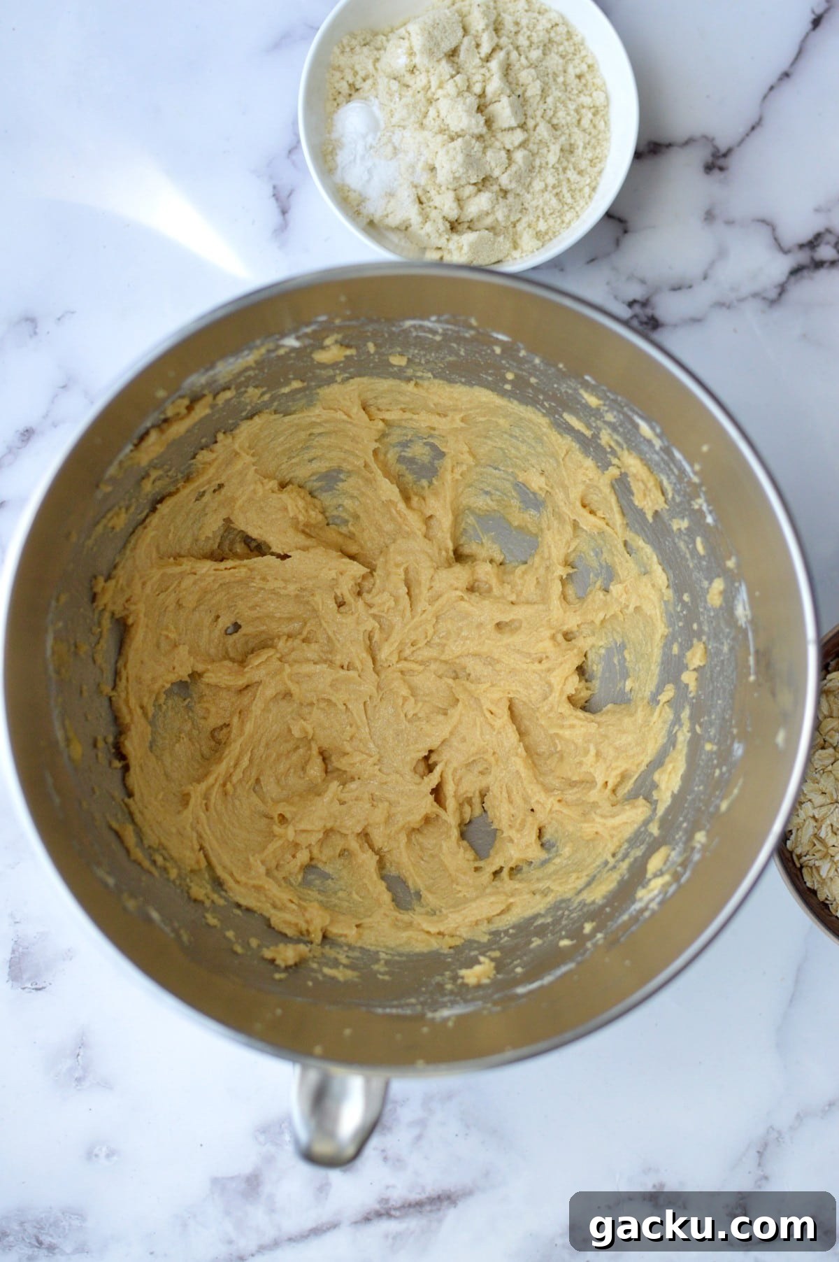 a bowl of butter, sugar, and egg
