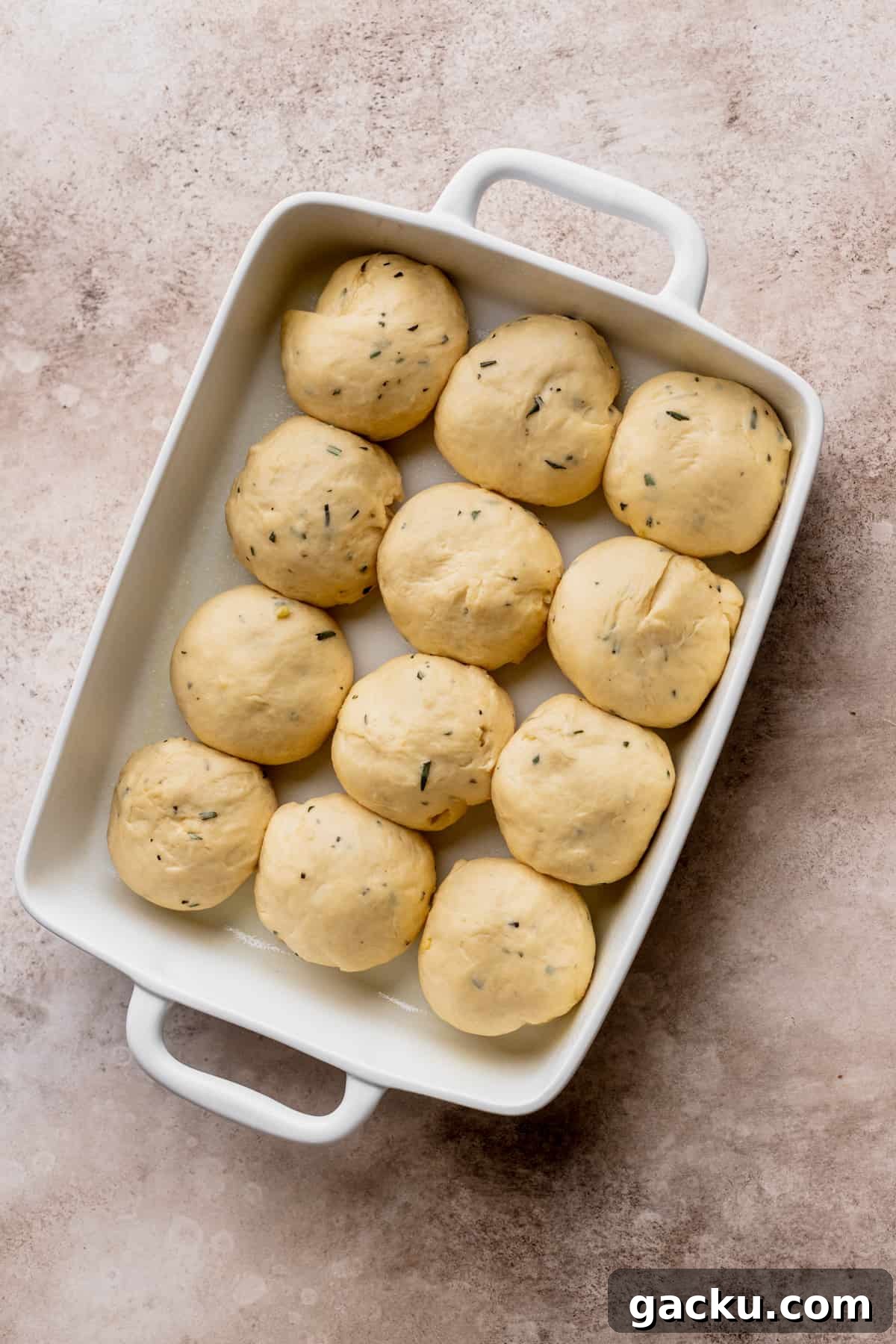 Dough rolls in a pan.