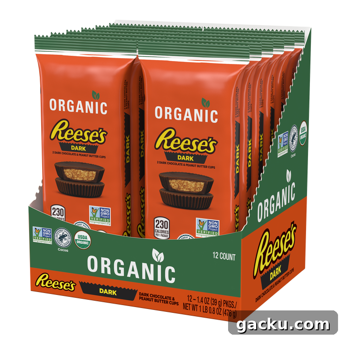 An angled view shows an orange and green retail box containing a 12-count of Organic Reese's Dark dark chocolate and peanut butter cups.