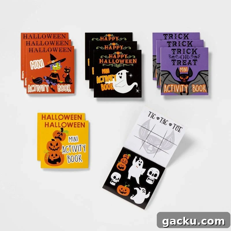 A variety of mini Halloween-themed activity books and notepads are displayed in a grid on a white background, including designs with a witch, ghosts, bats, and pumpkins.