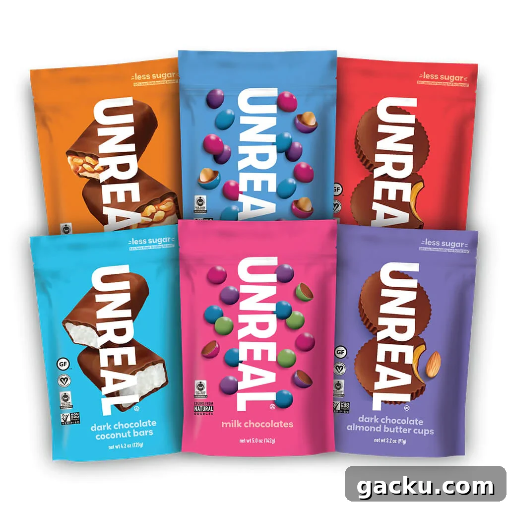A variety of six colorful pouches of Unreal brand non-gmo candy are shown arranged in a grid-like pattern.
