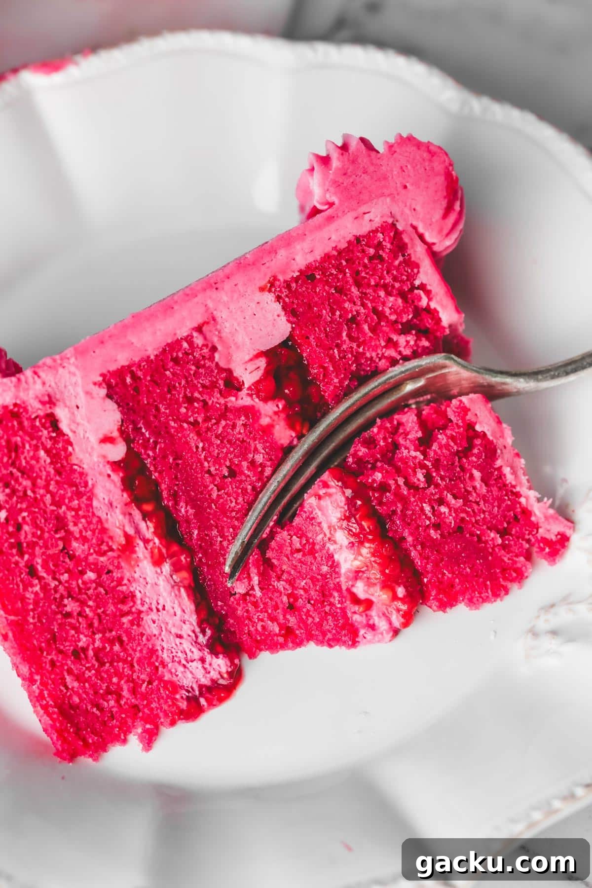 sliced raspberry cake on a plate