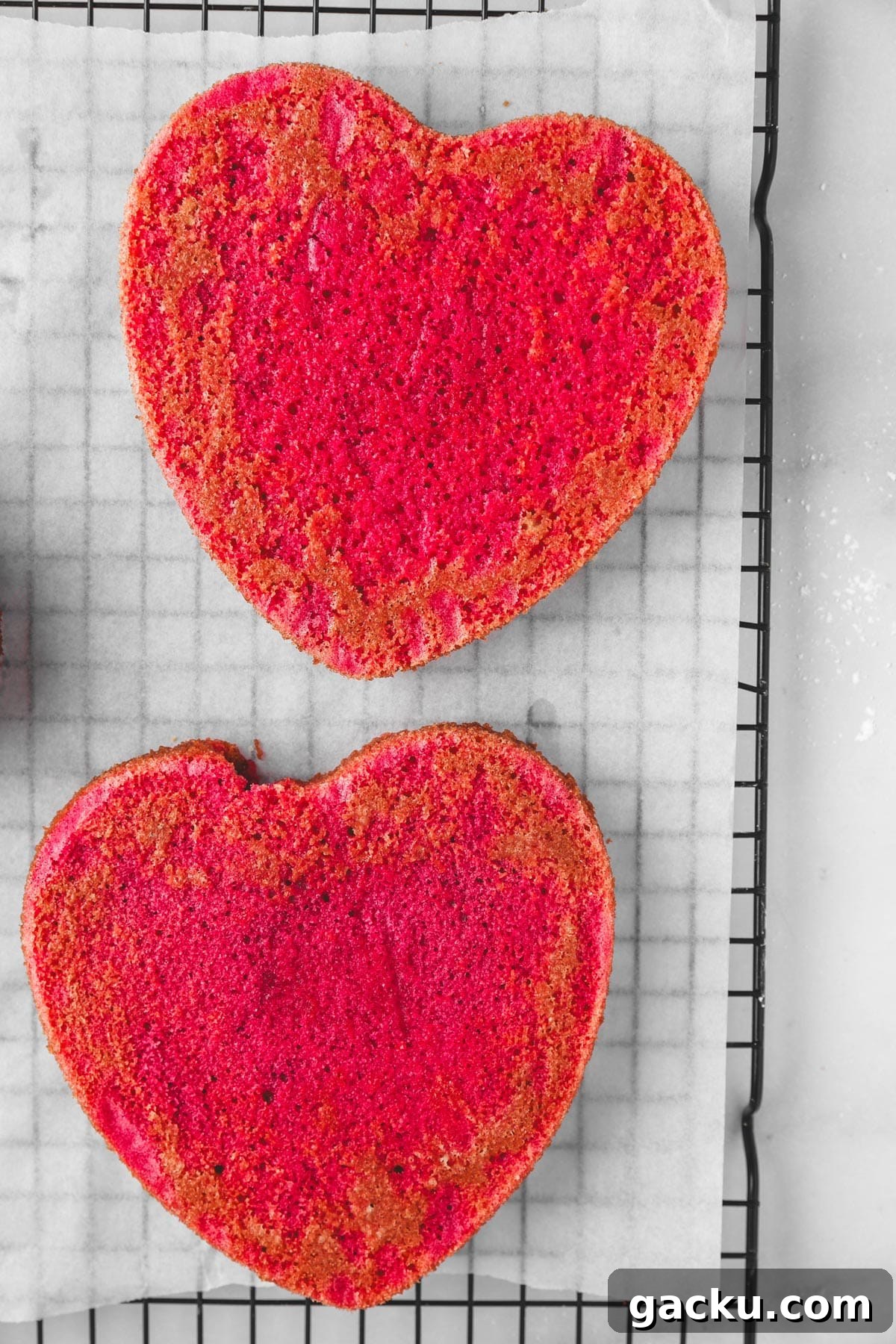 baked pink heart cake layers
