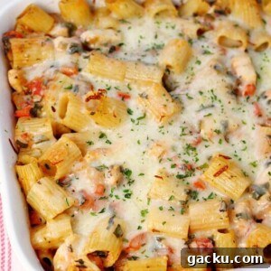 Six-Cheese Baked Chicken Pasta with Crispy Golden Top 4 Six Cheese Chicken Pasta Bake in a casserole dish.