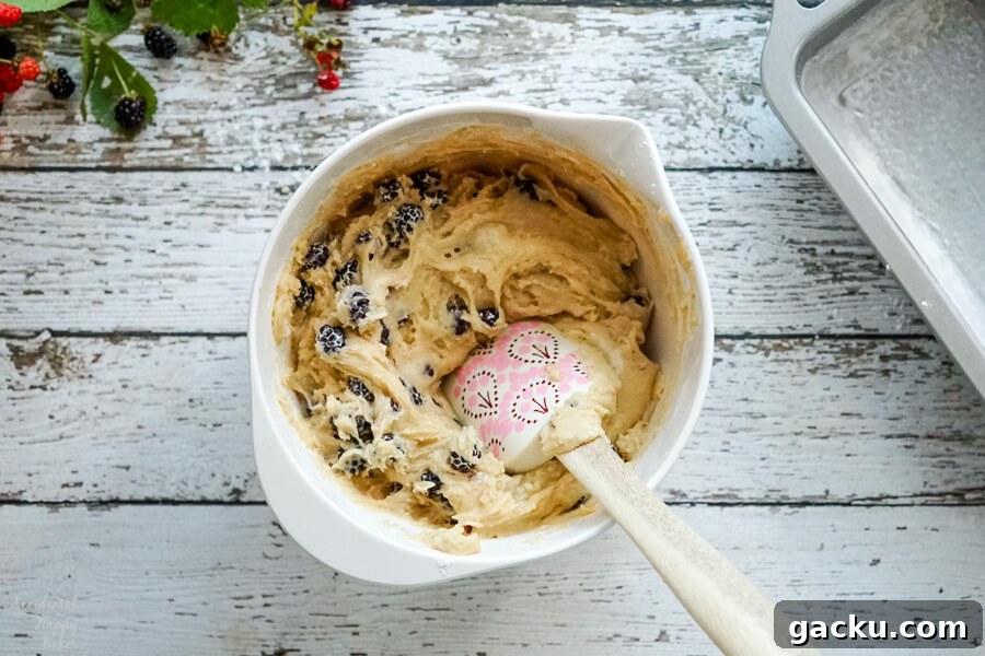 Moist Homemade Blackberry Bread Recipe for Summer Baking 3 A mixing bowl of bread batter after the blackberries have been mixed in.