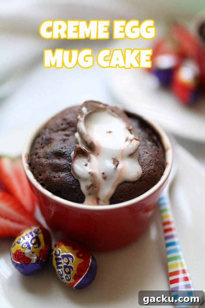 No-Bake Easter Cornflake Crunch: Kid-Friendly Holiday Treat 5 A Cadbury's creme egg mug cake served in a red ramekin with mini creme eggs and strawberries.