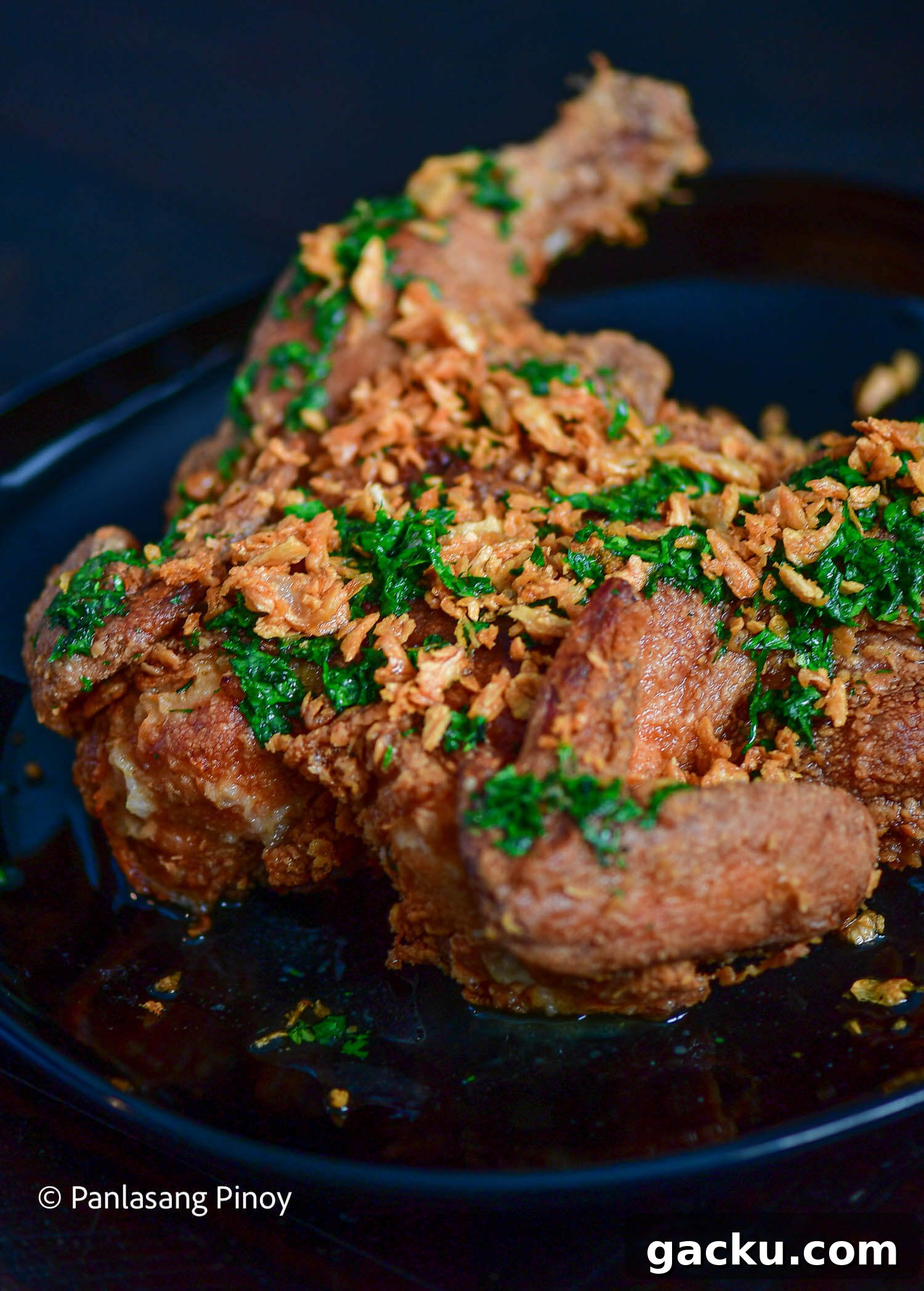 fried whole chicken with garlic and butter