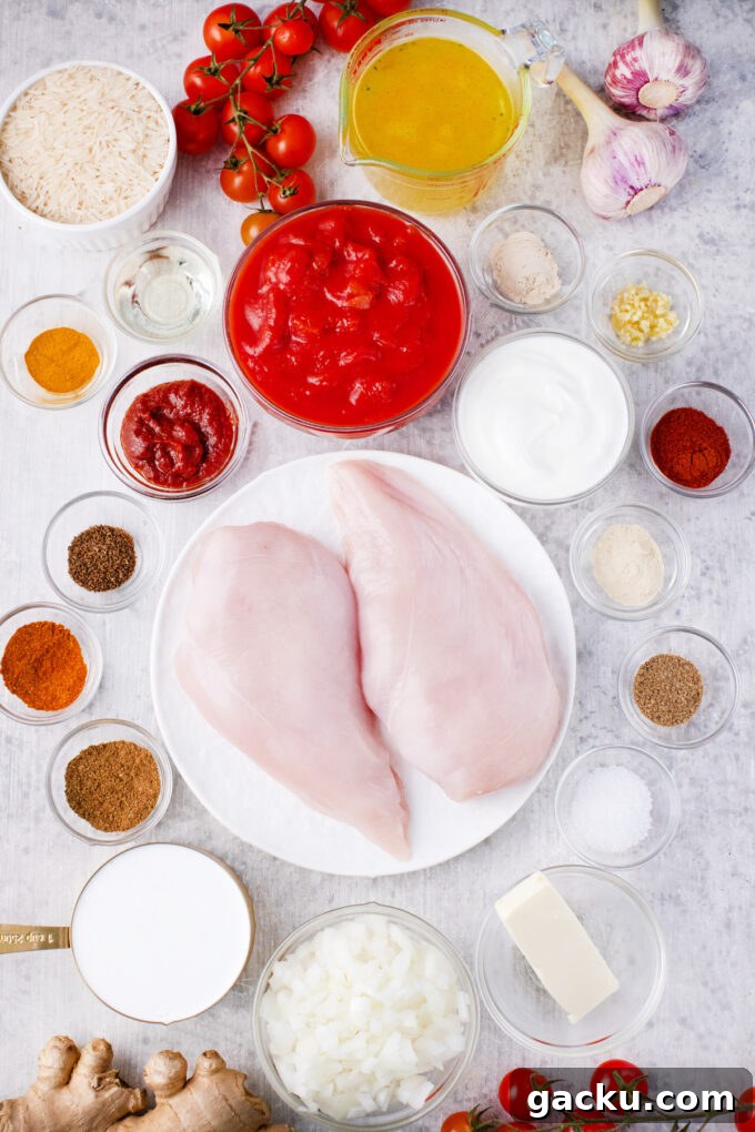 Instant Pot Chicken Tikka Masala with Fragrant Basmati Rice 4 Overhead shot of Instant Pot chicken tikka masala ingredients in bowls on a table.