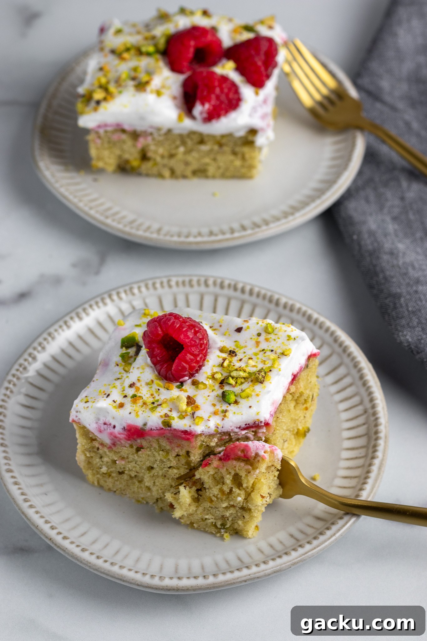 Pistachio Raspberry Cake Recipe with Moist, Nutty Layers 3 Slice of cake with raspberries