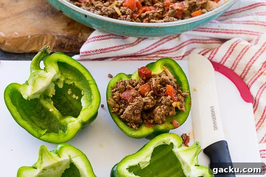 Air Fryer Taco-Stuffed Bell Peppers | Low-Carb Dinner Idea 4 Stuff peppers with taco mixture.