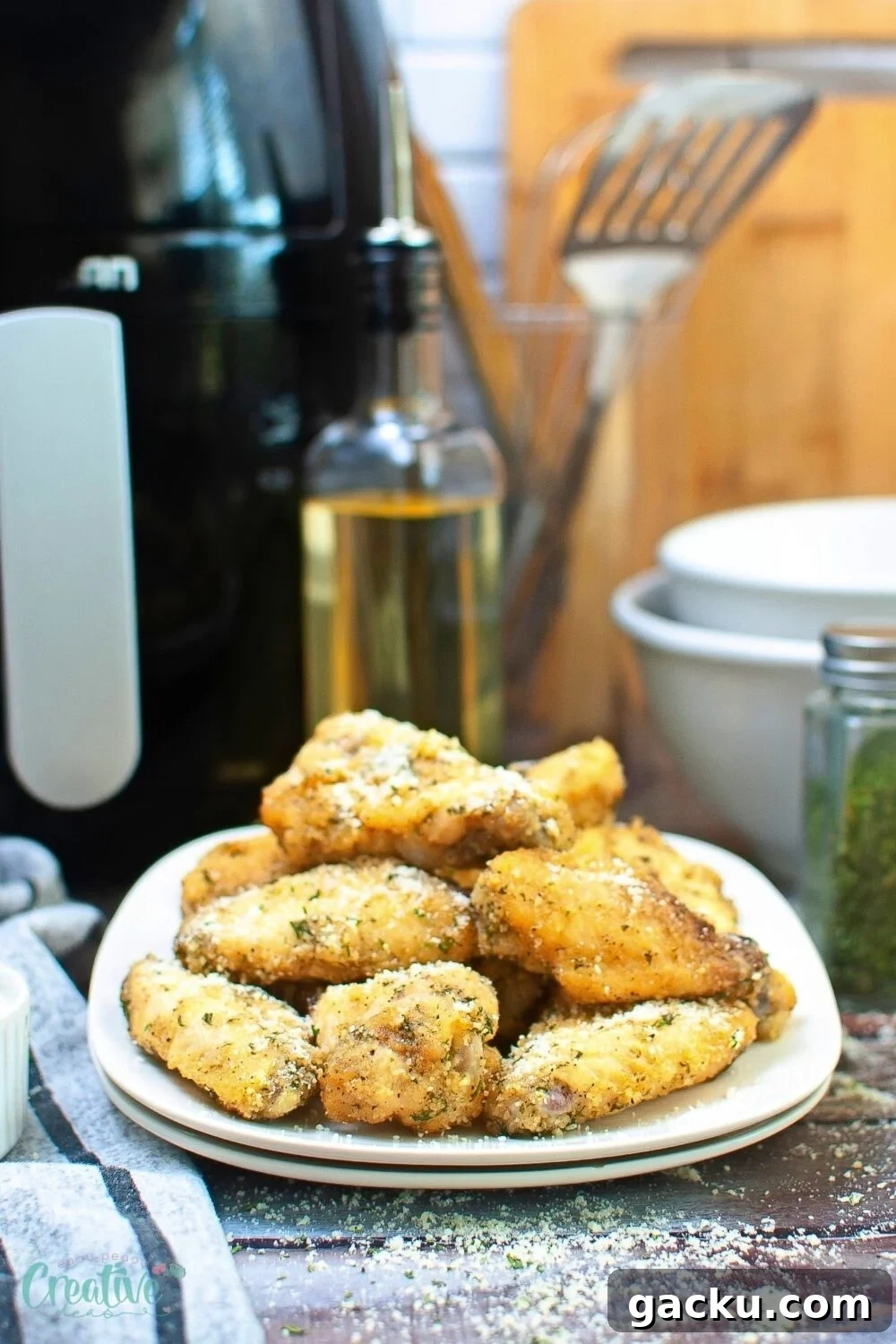 Crispy Garlic Parmesan Chicken Wings in the Air Fryer 3 Upgrade your chicken wing game with these irresistible baked garlic parm air fryer wings - crispy, juicy, and guilt-free!