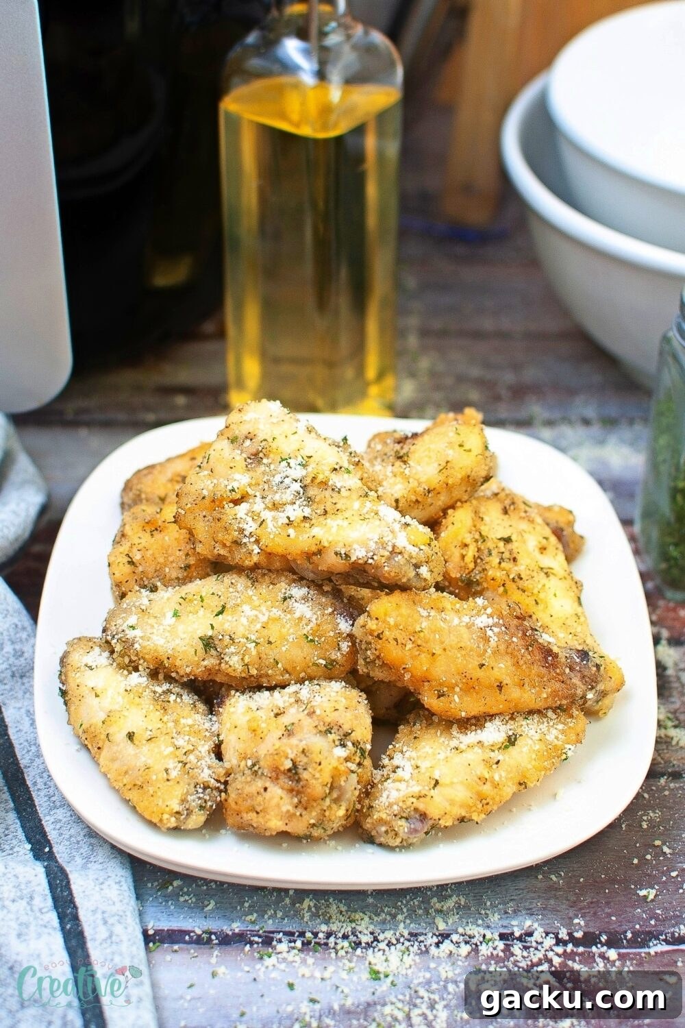Crispy Garlic Parmesan Chicken Wings in the Air Fryer 4 Flavor-packed air fryer garlic parmesan chicken wings - a crispy, juicy twist on classic wings!