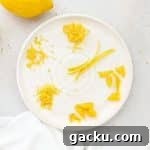six different sizes of lemon zest on a white plate