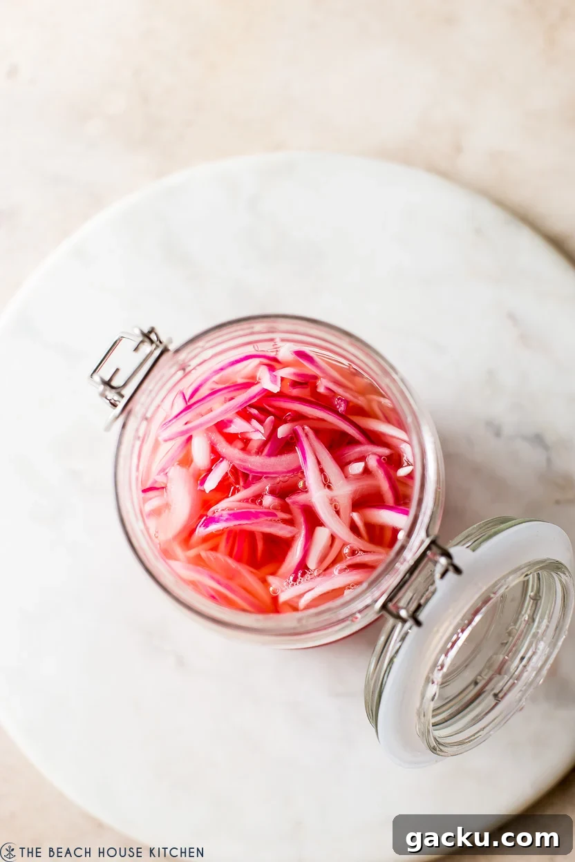 Overhead photo of a jar of pickled red onions
