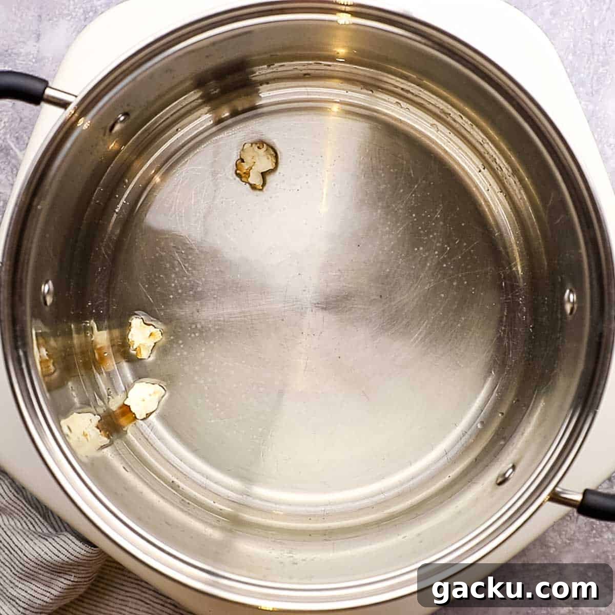 3 popped kernels in oil